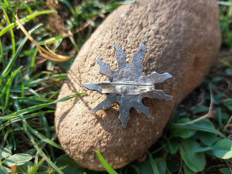 Eguzkilore broche floristería lorea