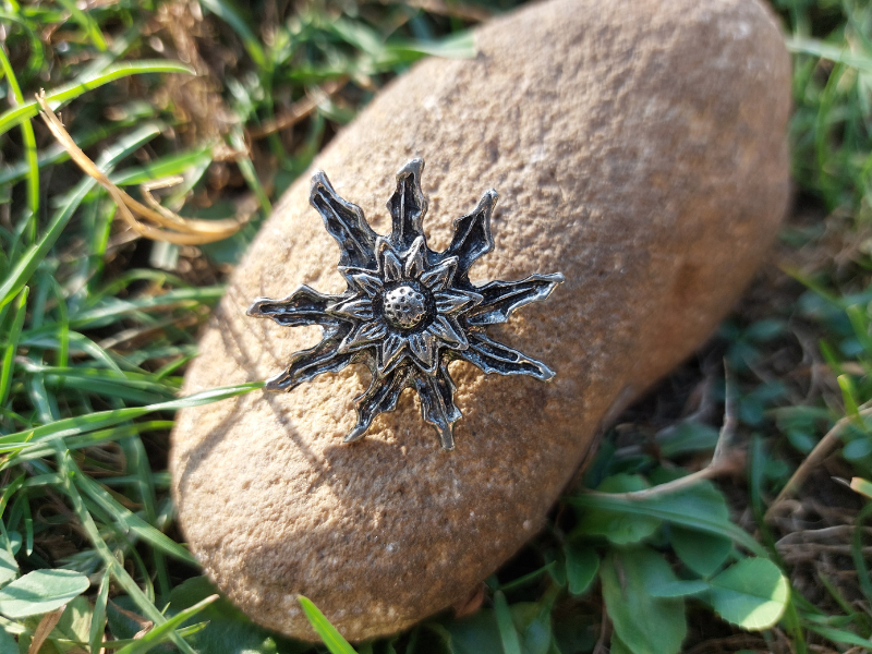 Eguzkilore broche floristería lorea