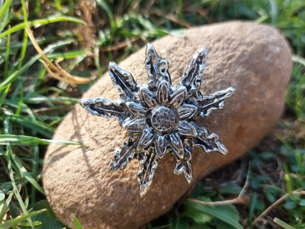 Eguzkilore broche floristería lorea