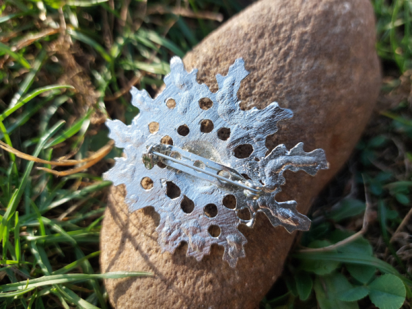 Eguzkilore broche trasera  floristería lorea